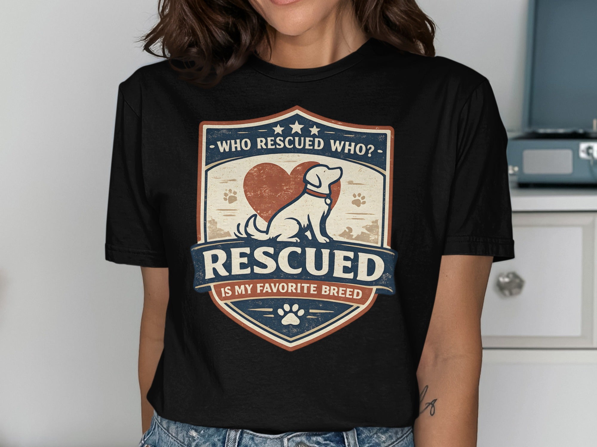 "Who rescued who? Rescued is my favorite breed" text with heart and dog silhouette.