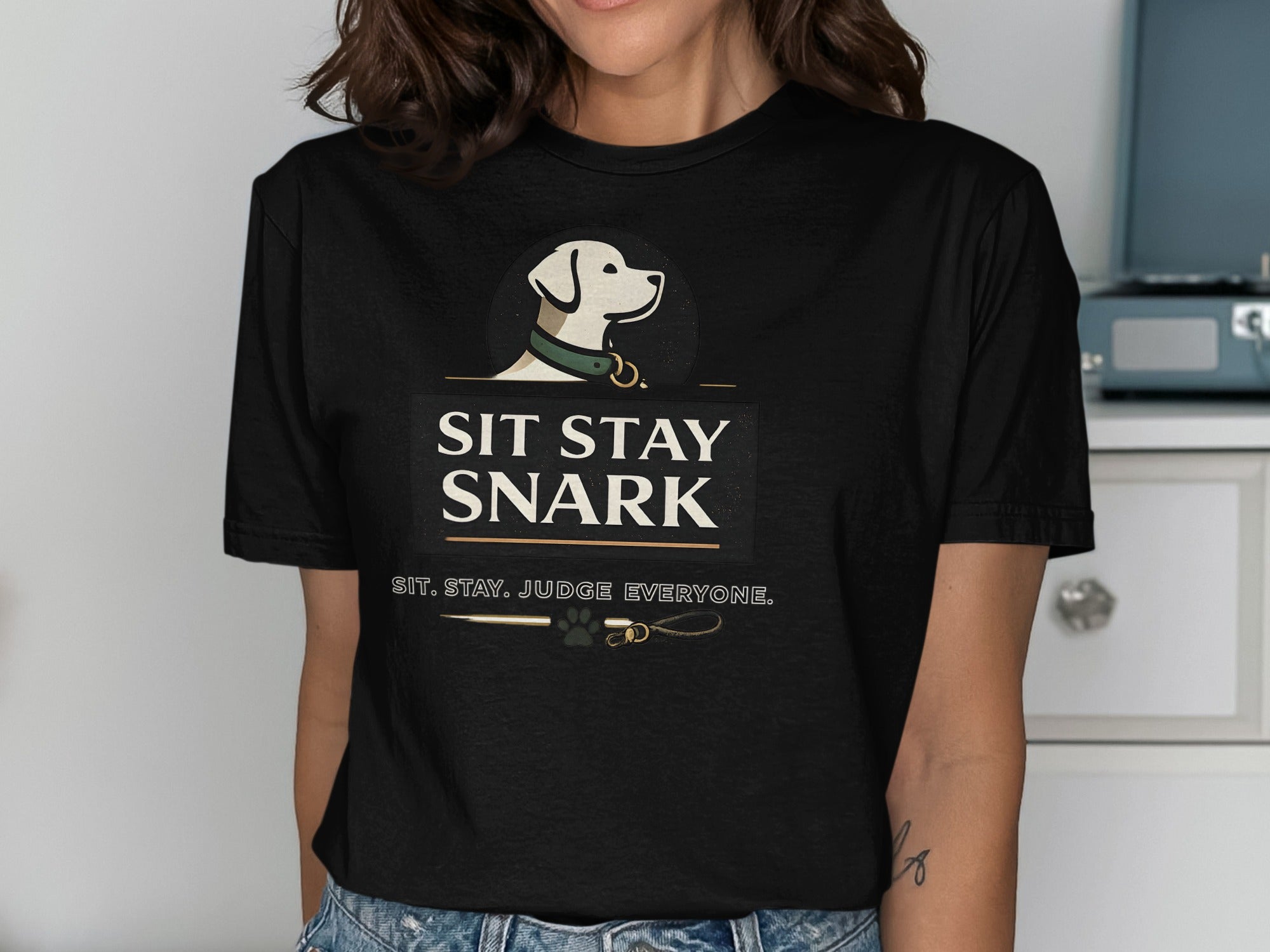 Black t-shirt with "Sit Stay Snark" and "Sit. Stay. Judge Everyone." text.