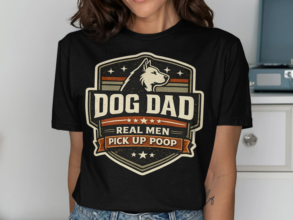 T-shirt with "Dog Dad Real Men Pick Up Poop" text and dog graphic.
