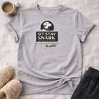 Grey t-shirt with "SIT STAY SNARK. JUDGE EVERYONE." text and dog logo.
