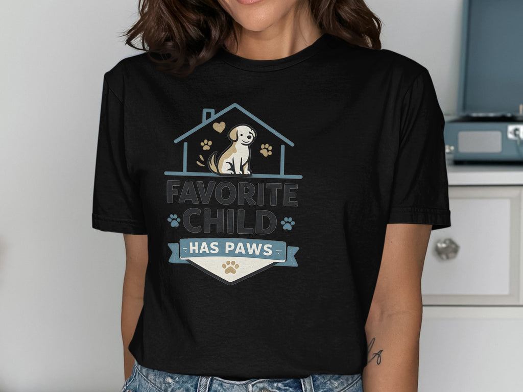 Black t-shirt with "Favorite Child Has Paws" text and a dog in a house graphic.