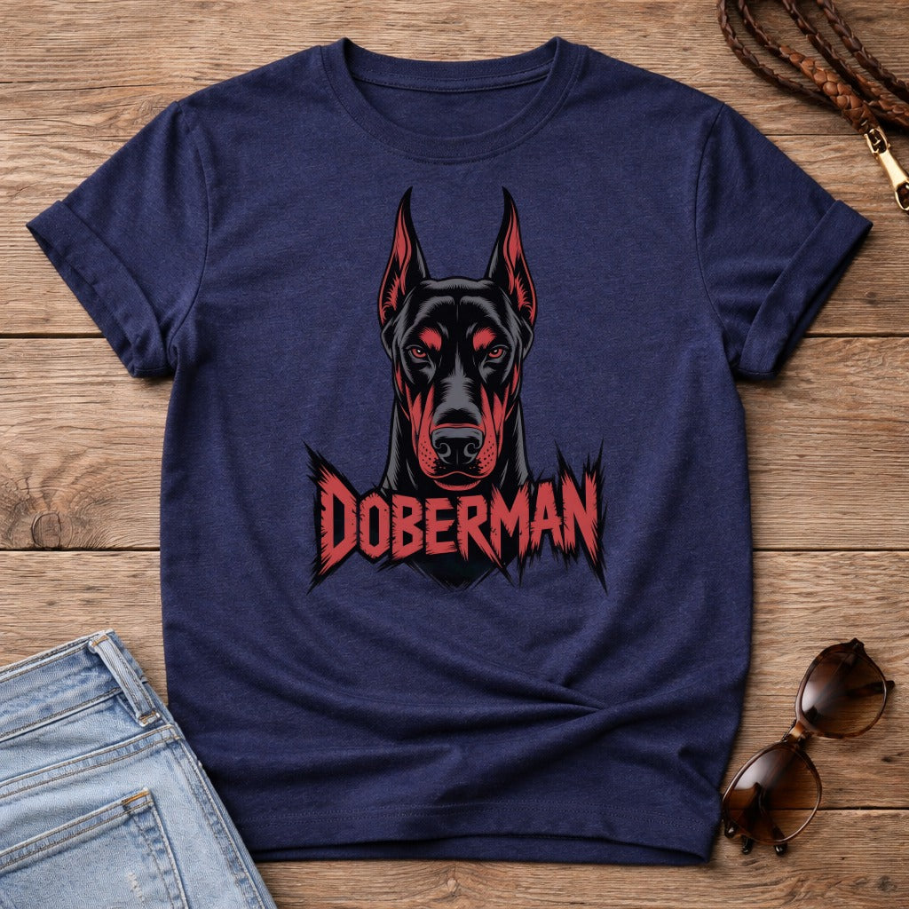 Doberman graphic t-shirt on navy blue shirt with denim shorts and sunglasses.