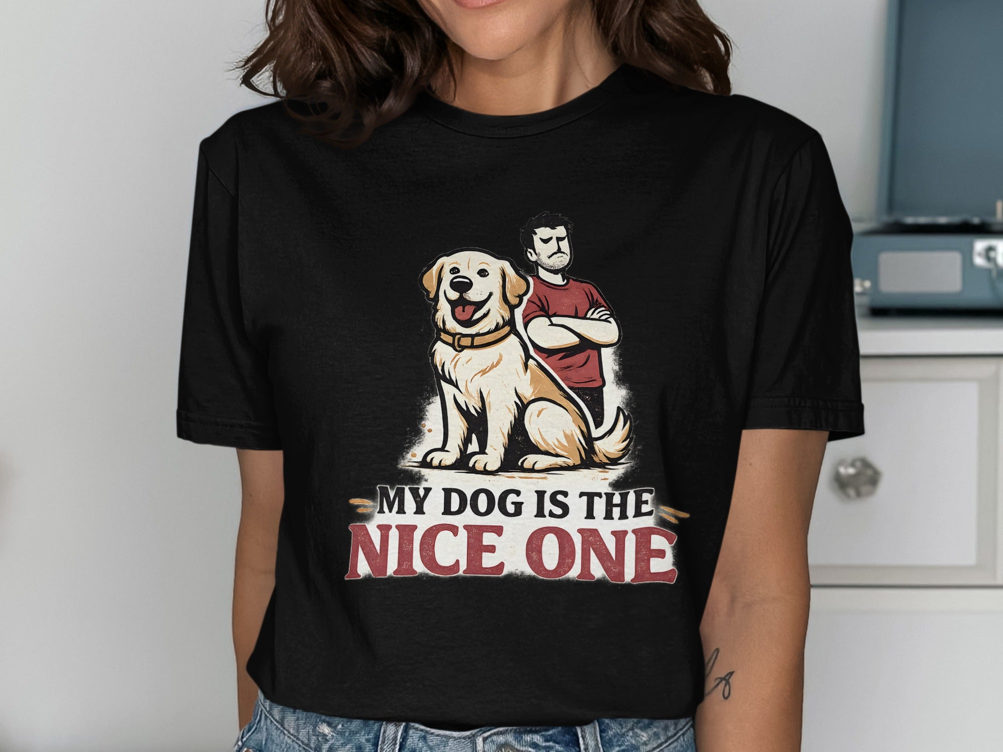 Graphic t-shirt with a dog and man saying "My dog is the nice one."