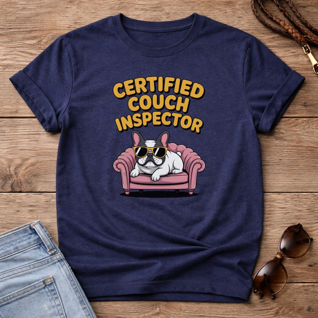 Navy t-shirt with "Certified Couch Inspector" text and cartoon bulldog on a pink sofa.