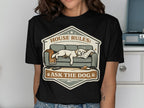 T-shirt with a golden retriever sleeping on a couch, "House Rules: Ask the Dog" text.
