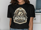 Dog wearing a crown on a throne with text "THE REAL BOSS".